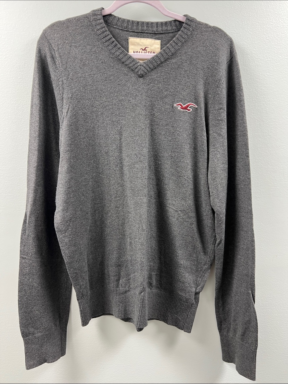 Hollister Men's Charcoal Gray V-Neck Sweater with Red Logo